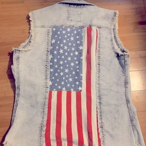 Trendy studded American flag waist length vest.